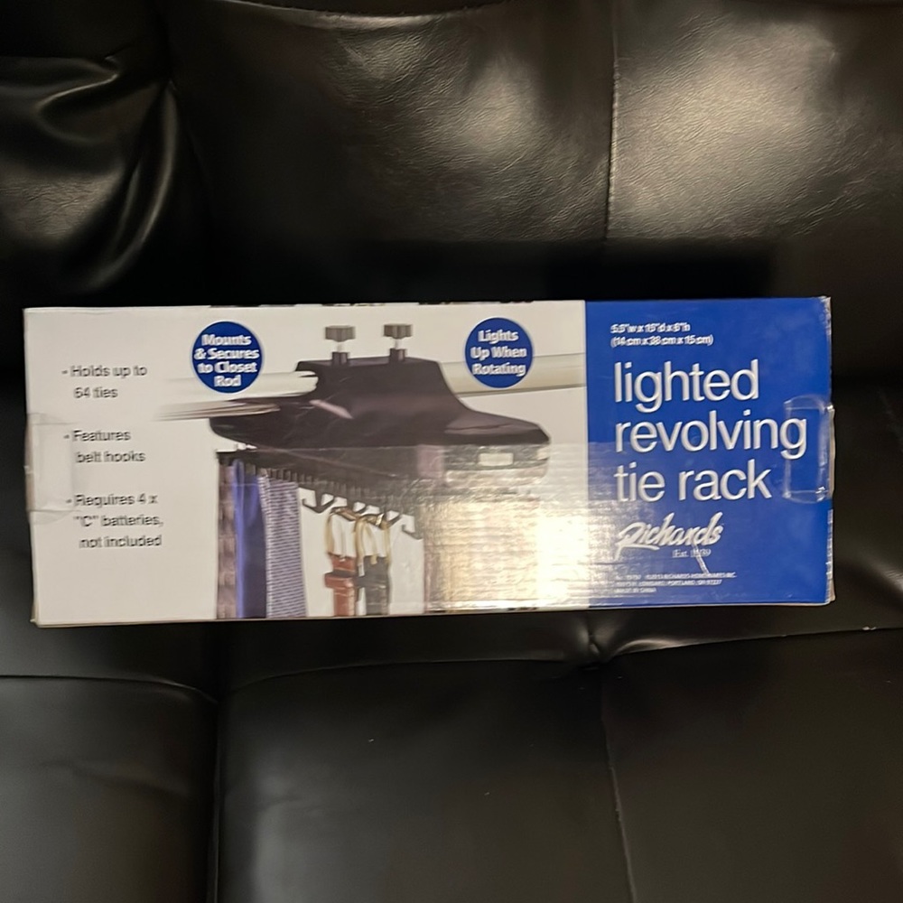 Brand new lighted revolving tie rack